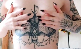 tattooed-redhead-babe-with-small-tits-gets-naked-on-webcam