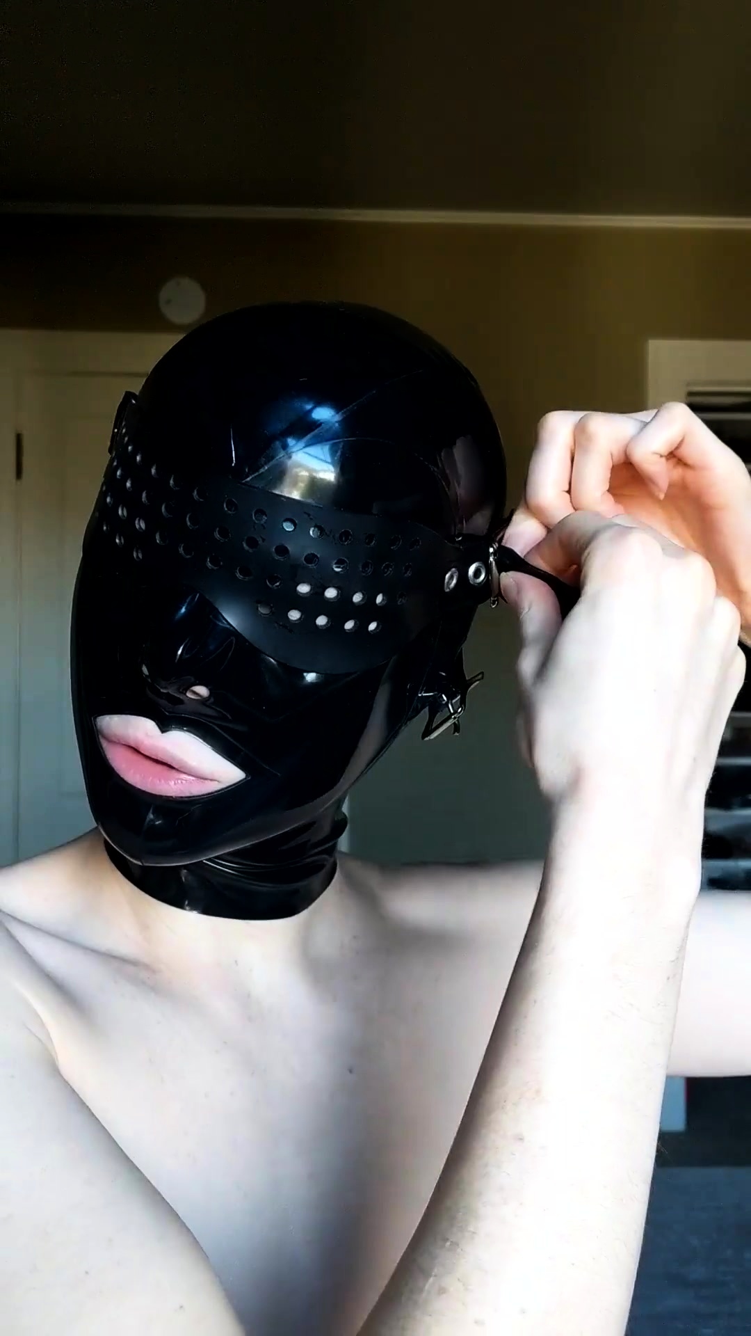 Beautiful Amateur BDSM Fetishist Trying On Latex Hood Mask Video  