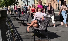 Pantyless European MILF vixen flashing her pussy in public